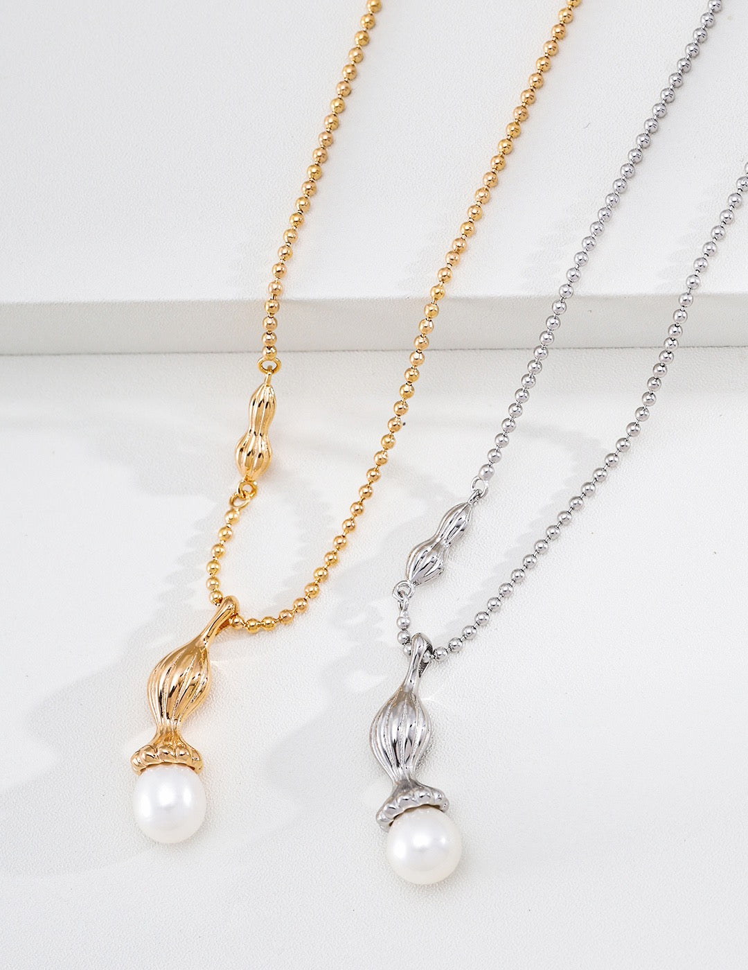 Calebasse Pearl Charm Necklace