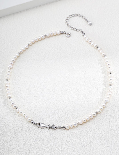 Poisson Pearl Strand Necklace
