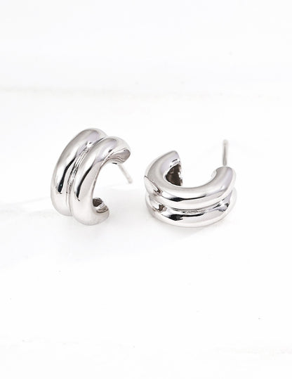 Trinité two-tone gold and silver huggie earrings