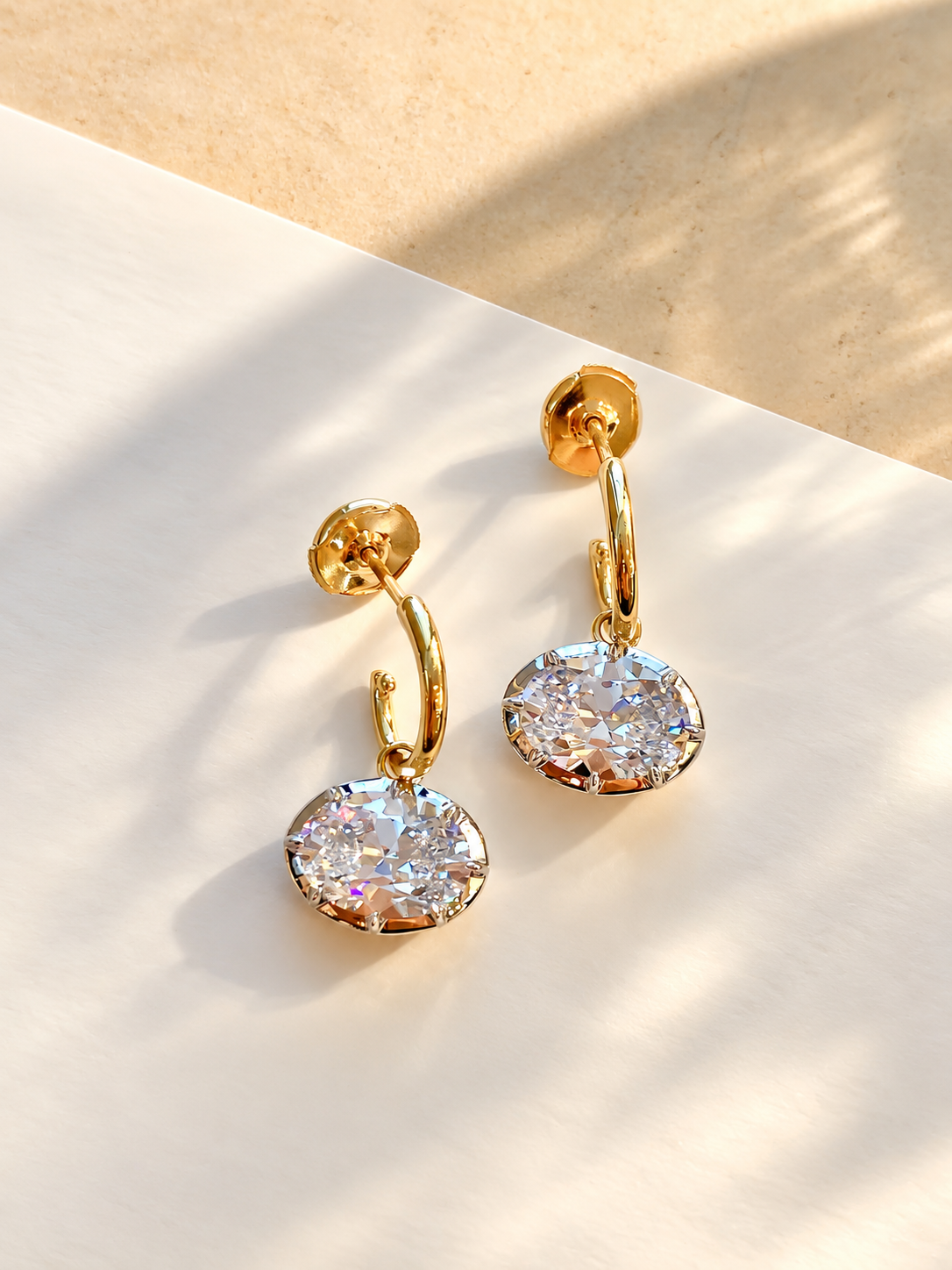 Gold-plated sterling silver oval cubic zirconia drop earrings